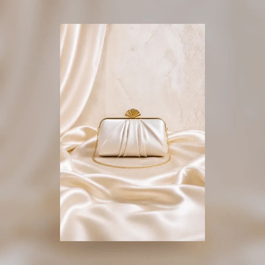 Lucia Satin Clutch — material detail showing texture, scale, and tonal character