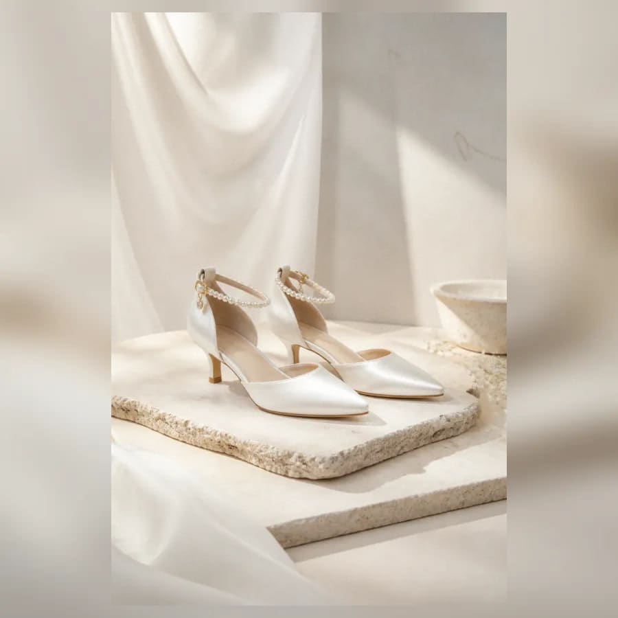 Noelle Satin Heels — close craftsmanship view showing construction and finish