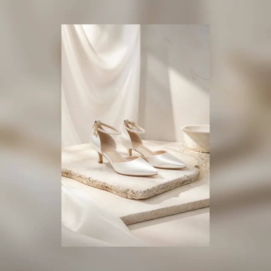 Noelle Satin Heels — material detail showing texture, scale, and tonal character